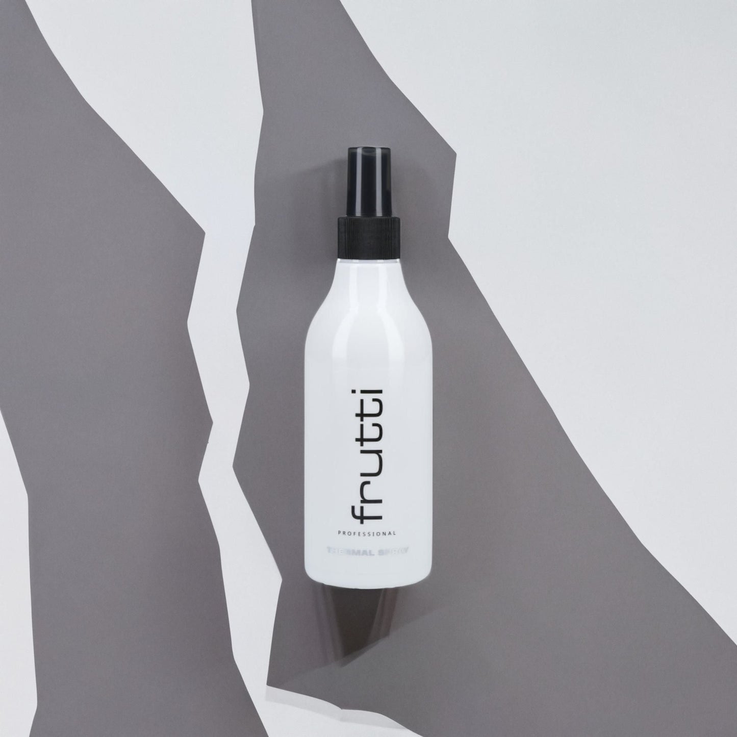 Frutti Professional - Spray Termoochronny na szaro białym tle